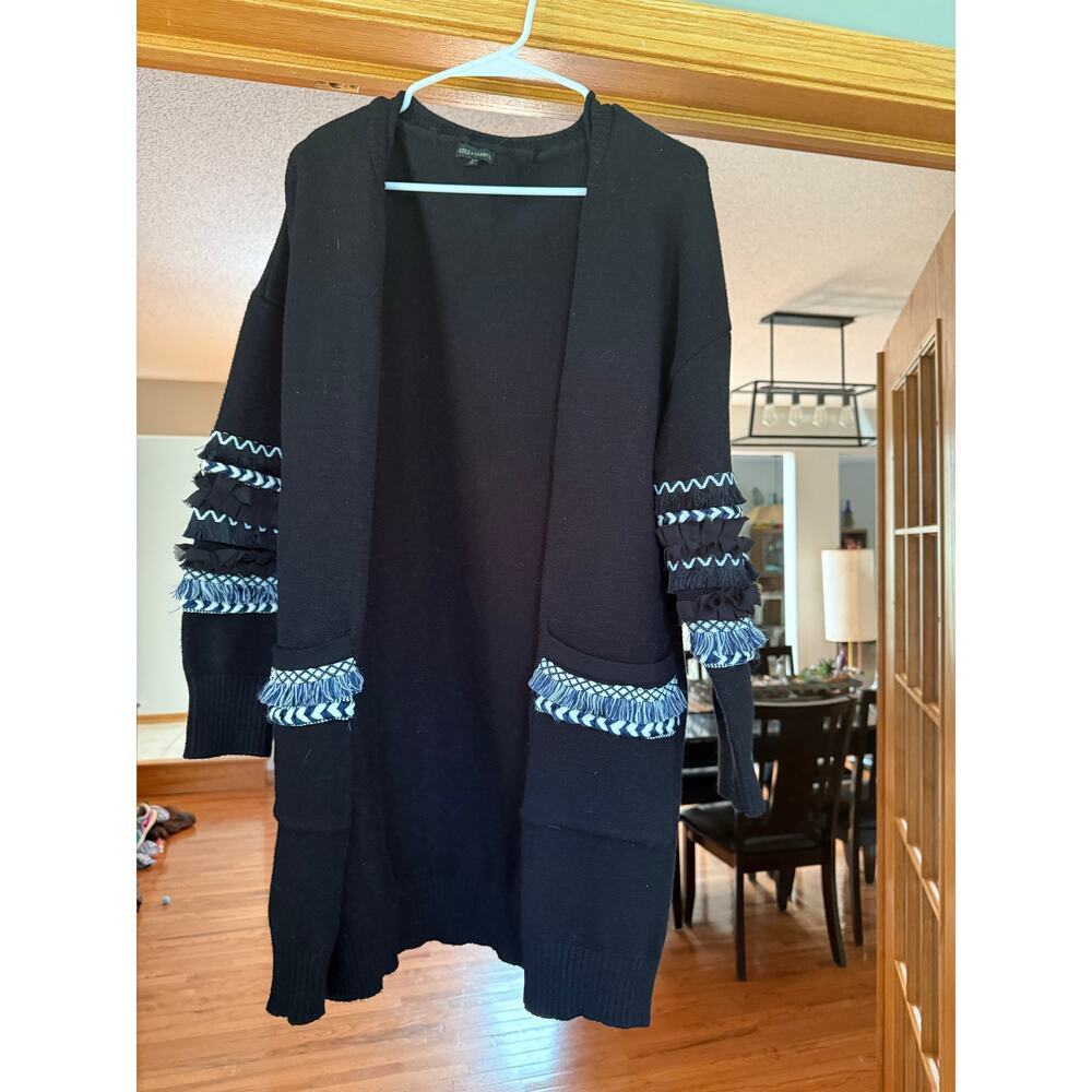 Cocoa & Carmen open duster Cardigan
fabric fringe detail. On cuffs, pocket s/m